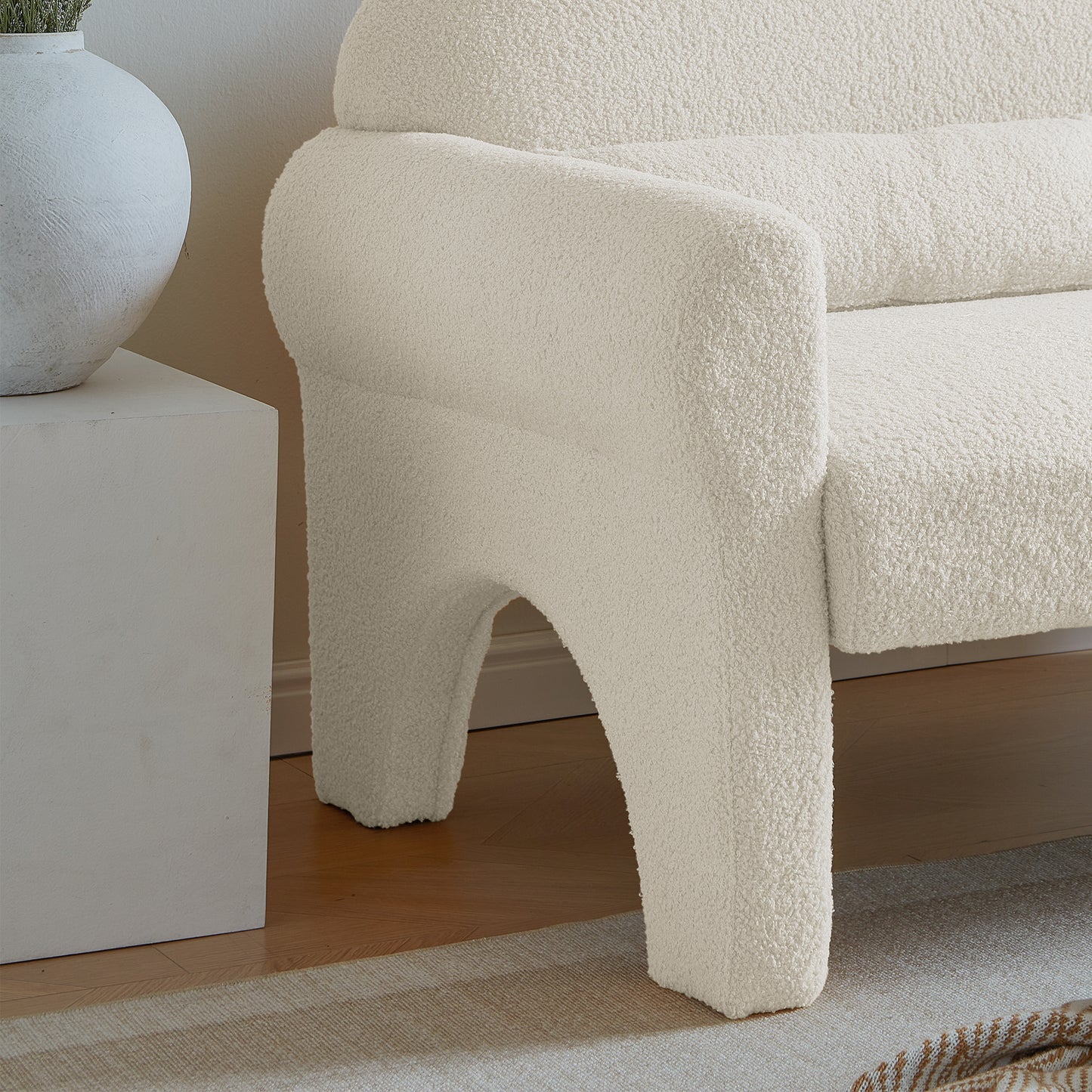 Modern boucle accent chair with lumbar pillow