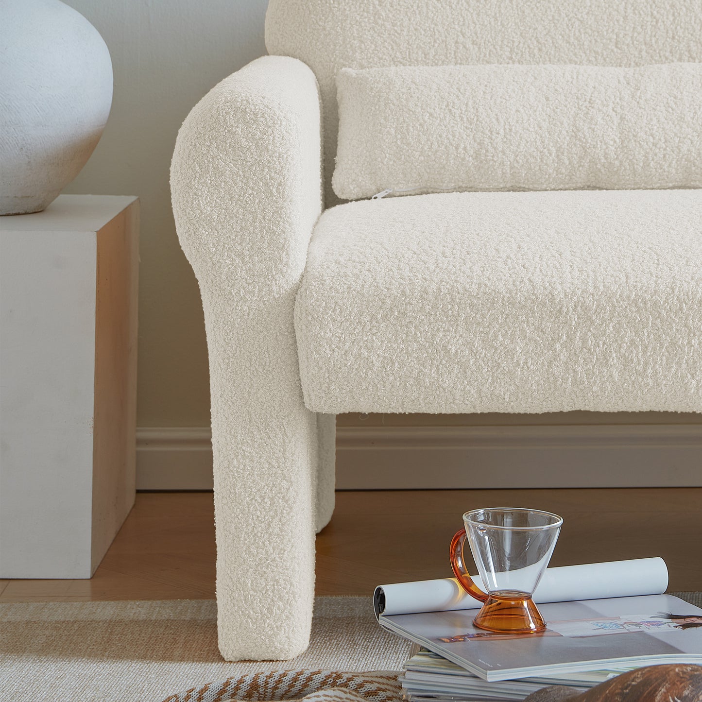 Modern boucle accent chair with lumbar pillow