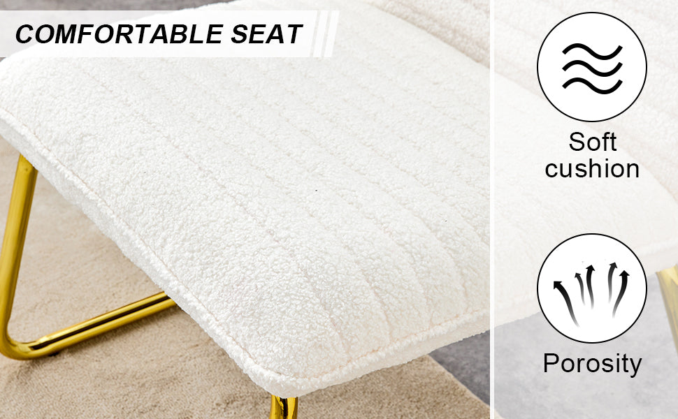 One White minimalist armless sofa chair with plush cushion and backrest paired with golden metal legs